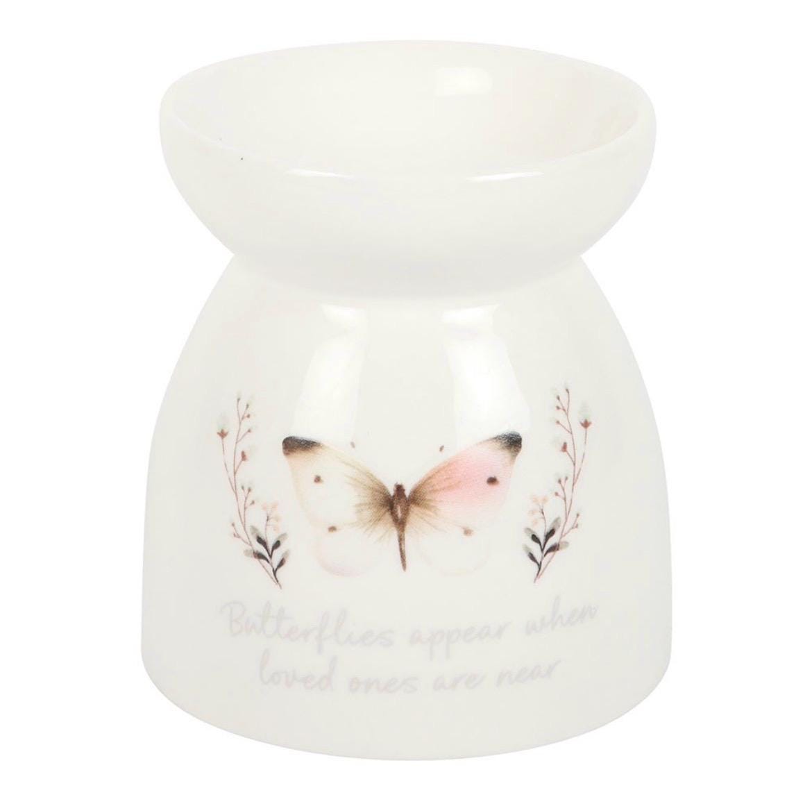Schmetterling Wachsmelt oder Ölbrenner „Butterflies appear when loved ones are near“